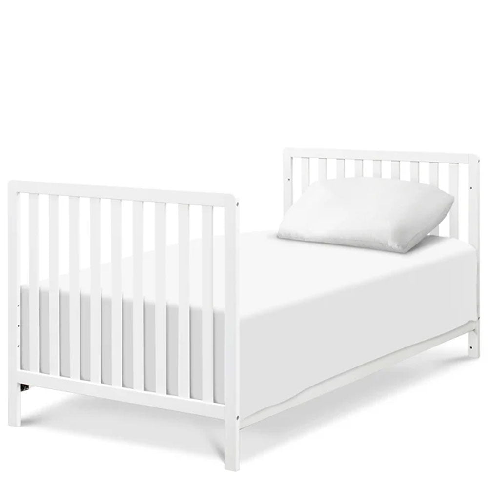 Modern Colby 4-in-1 convertible mini crib with storage trundle, available in Los Angeles