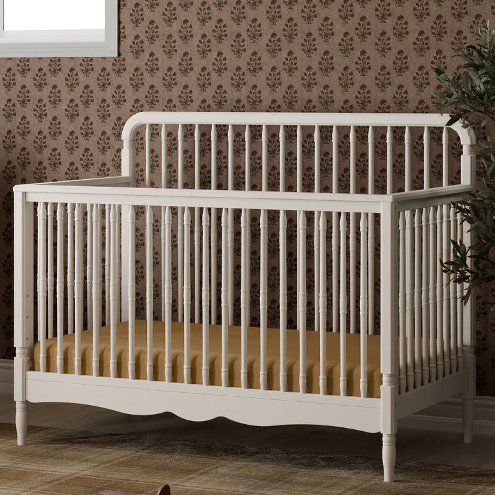 Convertible spindle crib that grows from newborn to toddler bed and full size, available at Kids & Baby Superstore in Eagle Rock, CA