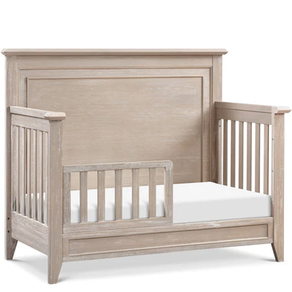 Beckett rustic 4-in-1 convertible crib in sandbar finish styled in a cozy nursery, ideal for Pasadena and Glendale baby rooms.