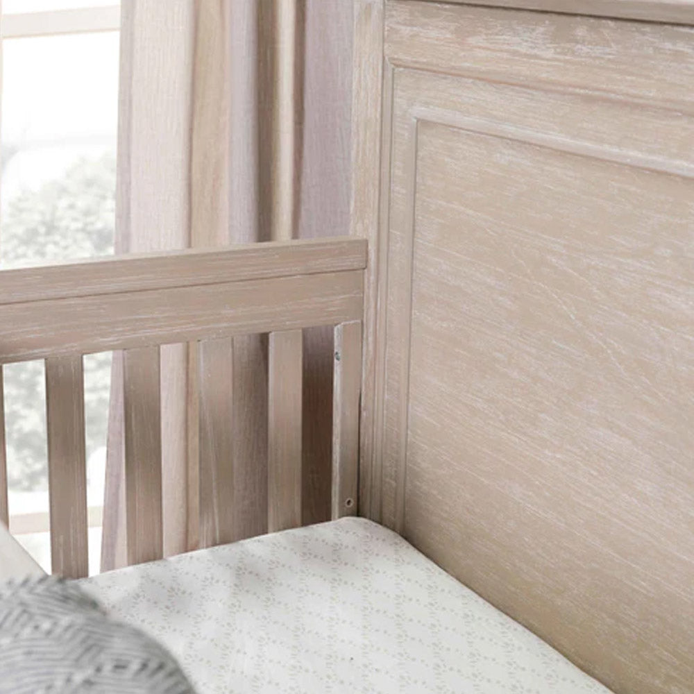 Beckett rustic convertible crib in toddler bed setup, offering lasting use for Los Angeles families from newborn to toddler years