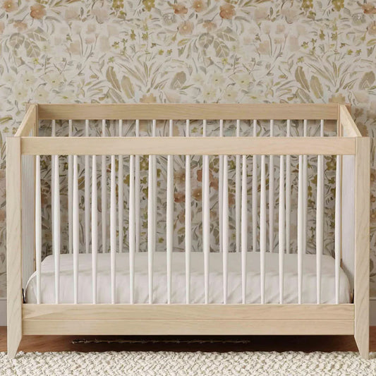 Modern 4-in-1 convertible crib in natural wood and white, available at Kids & Baby Superstore in Eagle Rock Los Angeles.