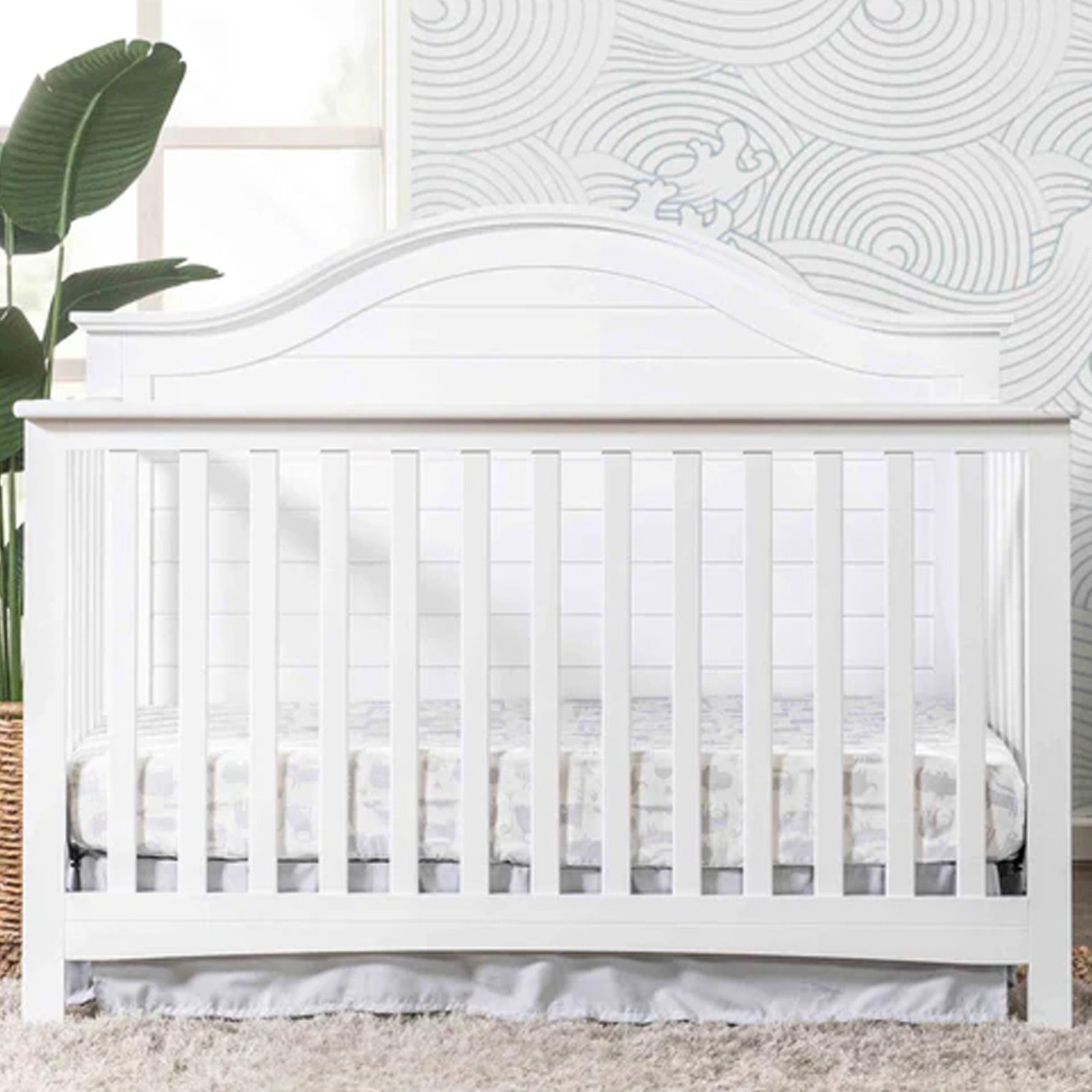 Nolan 4-in-1 convertible crib featuring a contemporary shiplap headboard and classic Americana styling available at Kids Furniture Superstore in Los Angeles