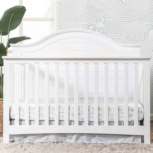 Nolan 4-in-1 convertible crib featuring a contemporary shiplap headboard and classic Americana styling available at Kids Furniture Superstore in Los Angeles