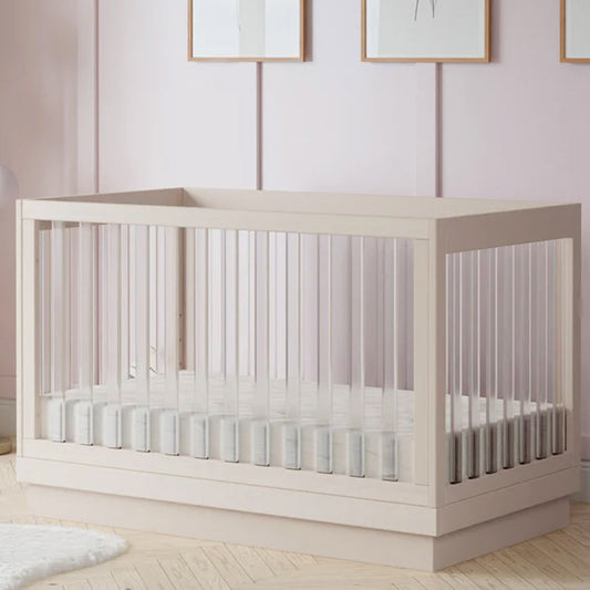 Acrylic 3-in-1 convertible crib with toddler bed option – nursery furniture in Los Angeles showroom