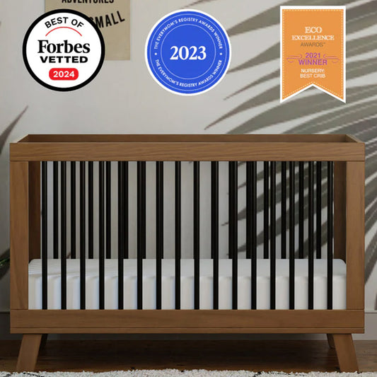 Natural walnut and black 3-in-1 convertible crib with toddler bed kit for nurseries in Los Angeles