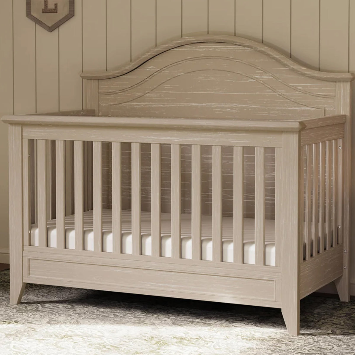 Premium Barrow Rustic convertible baby crib with curved headboard available in Los Angeles, California.