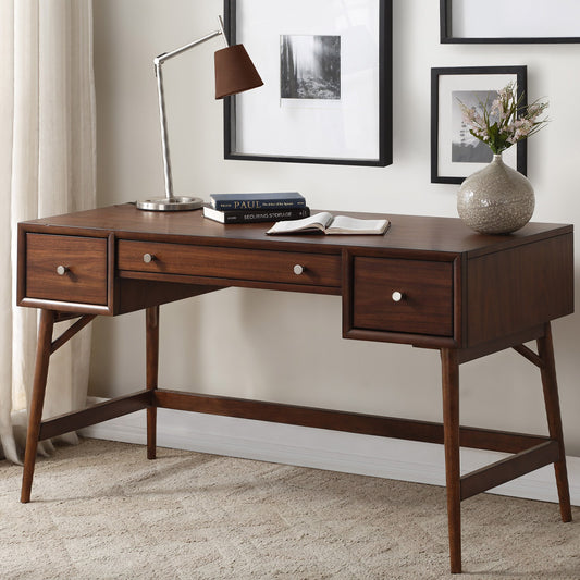 Brown mid-century writing desk with storage drawers for Los Angeles home offices.