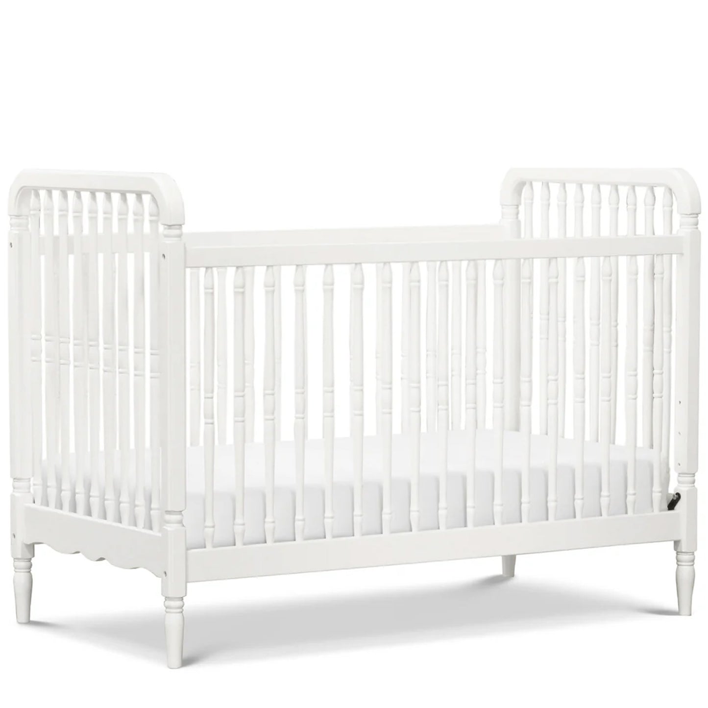 Elegant solid wood spindle crib with included toddler bed conversion kit for lasting value