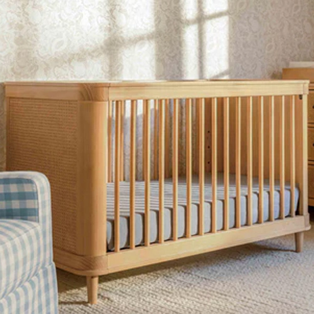 Marin 3-in-1 convertible crib in honey finish with cane panels, stylish nursery furniture for Los Angeles, Eagle Rock, Pasadena, and Glendale.
