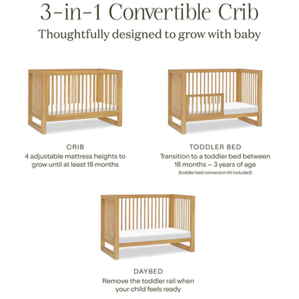 Close-up of honey wood Nantucket convertible crib with smooth finish and classic design, perfect for Los Angeles, Pasadena, and Glendale nurseries.
