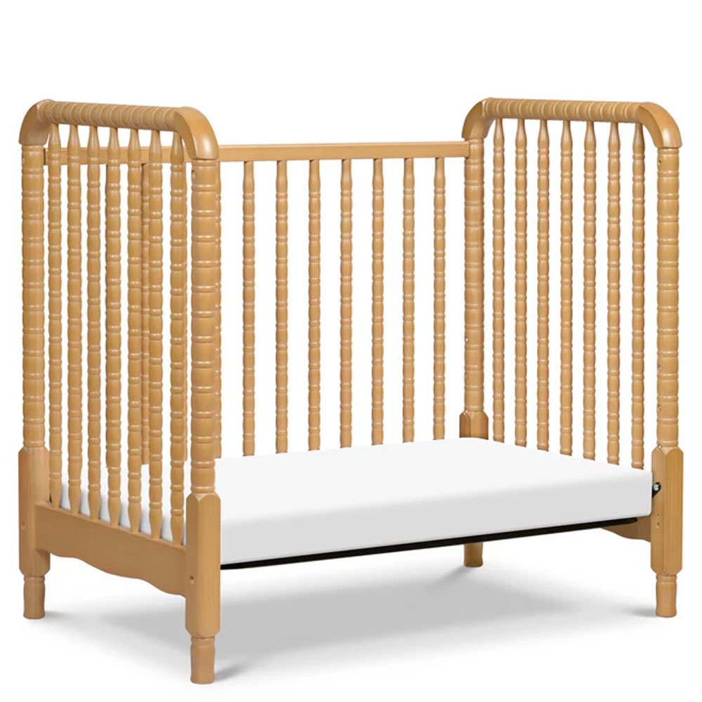 Stylish Jenny Lind convertible mini crib for babies, available at Kids & Baby Superstore in Eagle Rock.