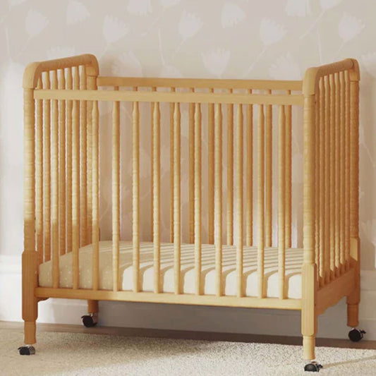 Jenny Lind 3-in-1 Convertible Mini Crib in honey finish, available in Eagle Rock Los Angeles.