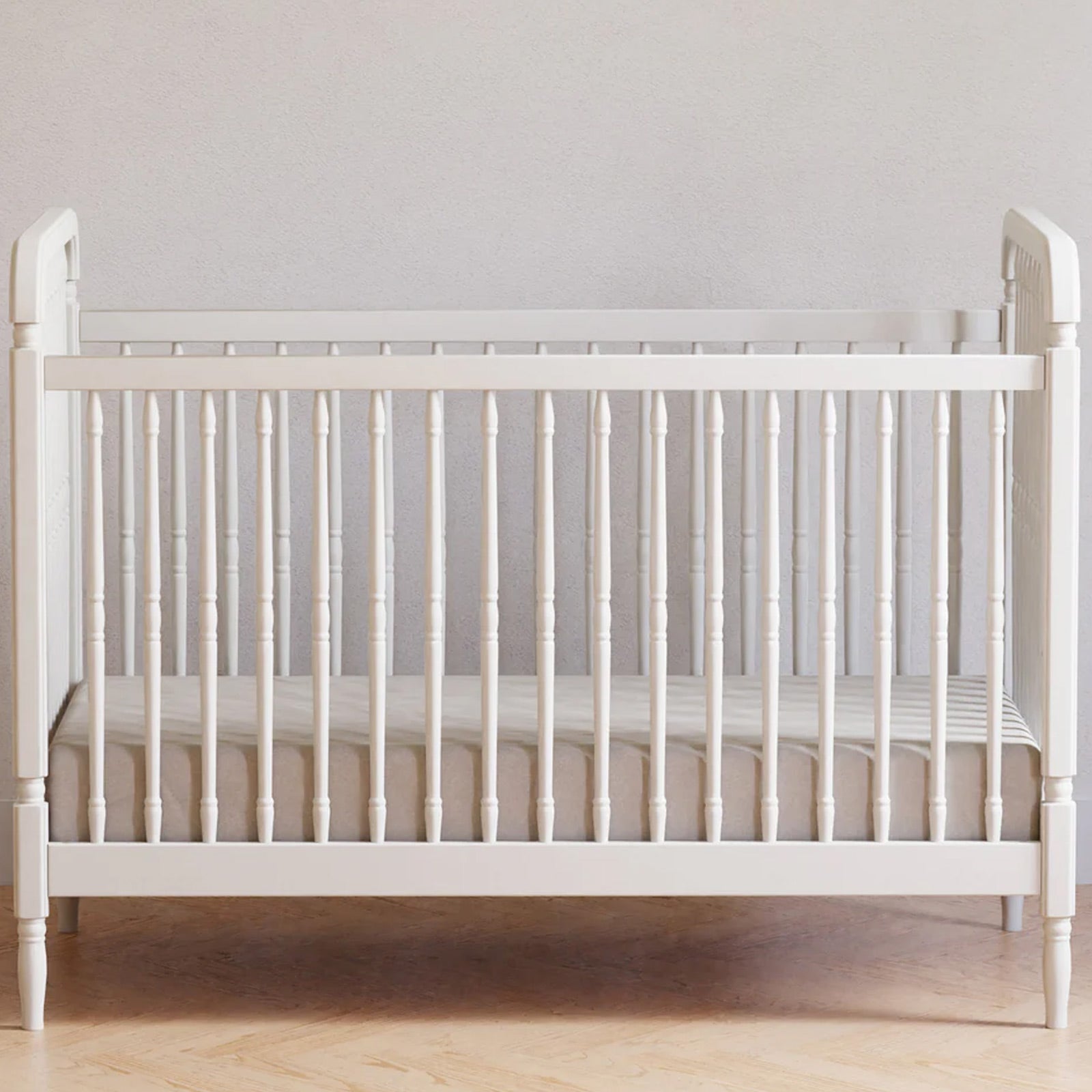 Timeless spindle-style baby crib with a classic design for modern nurseries throughout Southern California