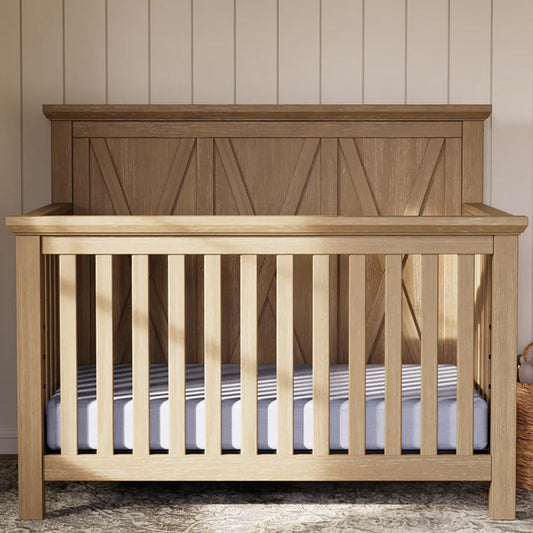 Rustic driftwood 4-in-1 convertible crib with farmhouse X-brace headboard – Los Angeles nursery furniture.