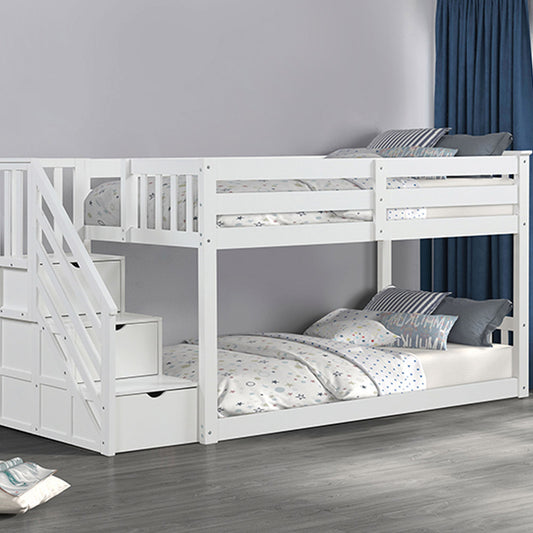 Low twin bunk bed in white with storage drawers in staircase in Los Angeles