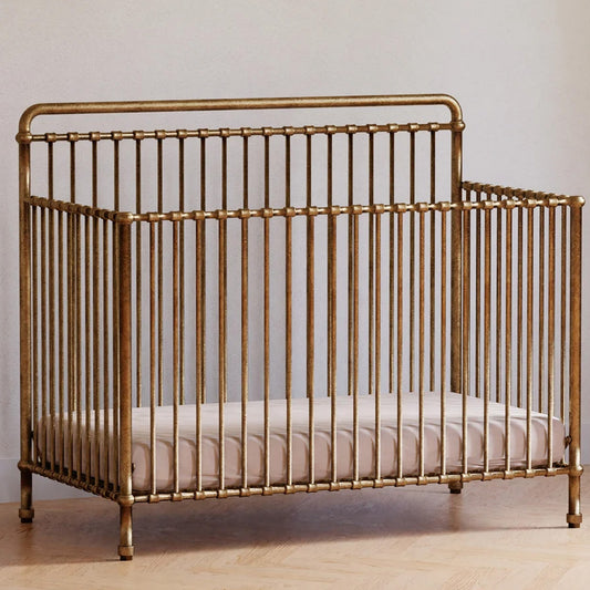Vintage Gold metal convertible crib for modern nurseries in Los Angeles