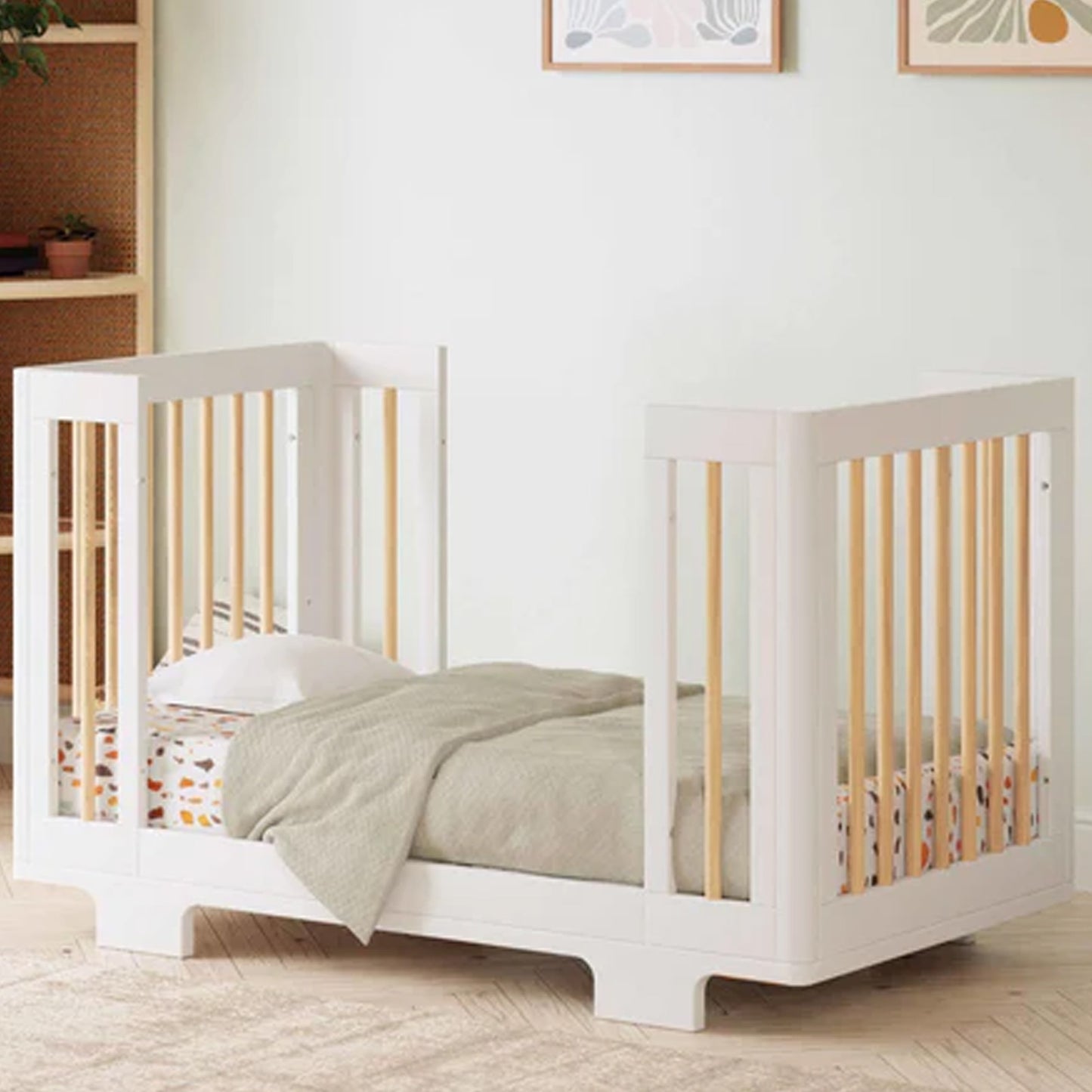 Side angle of the Yuzu 4-in-1 convertible crib